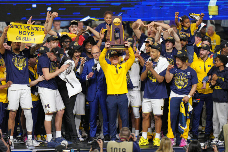 Michigan fights off UConn to win first national championship since 1989